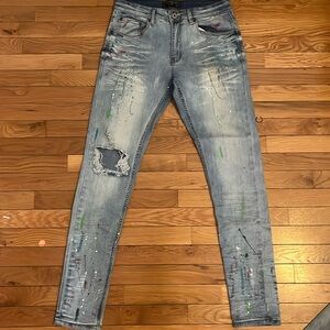 Skinny stretch paint splatter jeans.